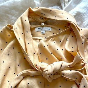 New with tags. Extra large equipment blouse. Pleated billowy sleeves. Dressy